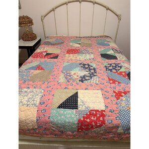 1940s quilt bedspread with feed sack and novelty fabrics hand stitched 67" x 80"